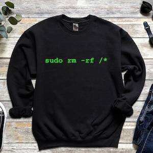 May include: Black sweatshirt with a green text print that reads "sudo rm -rf / *"
