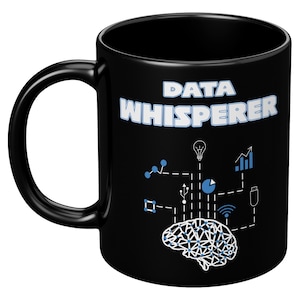 May include: Black ceramic mug featuring a white design that reads "DATA WHISPERER". The design also incorporates a brain with connected lines and icons representing data, analytics, and technology.