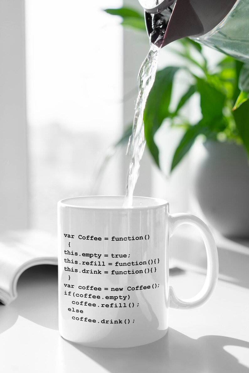 May include: White coffee mug with black text that reads: "var Coffee = function() { this.empty = true; this.refill = function() {} this.drink = function() {} } var coffee = new Coffee(); if (coffee.empty) coffee.refill(); else coffee.drink();"