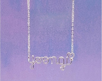 May include: Silver necklace with the name "Yoongi" spelled out in wire with a small heart at the end.