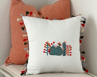 Geborduurde boho-sierkussenhoes: luxe katoenen kussen met kwastjes