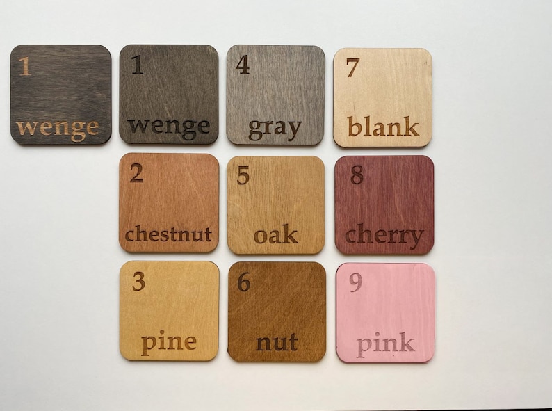 May include: Nine wood samples with numbers and names of wood types: wenge, chestnut, pine, oak, cherry, nut, gray, blank, and pink.
