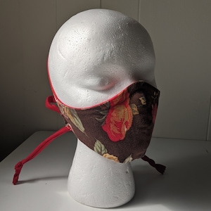 Bright red linen with brown floral child/teen mask