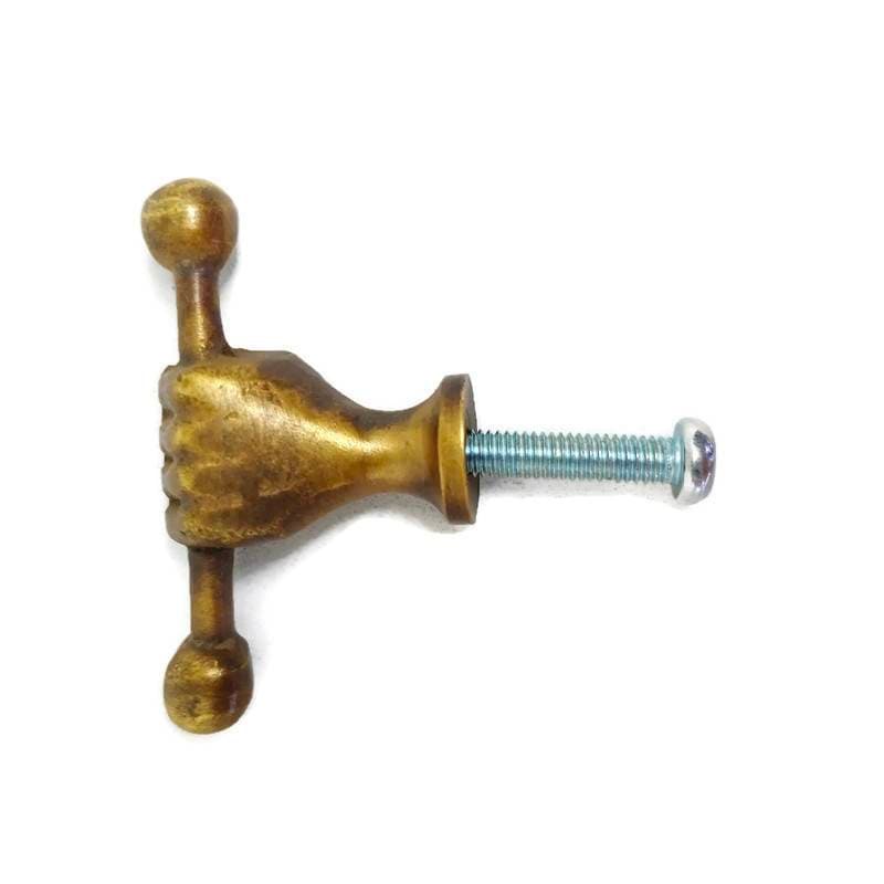 Small Brass Knobs On Grey Kitchen Stock Photo 1348166111