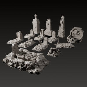 May include: A set of 12 miniature grey painted tombstones and grave markers with various designs, including skulls, crosses, and a coffin. The tombstones are arranged on a grey, textured surface.