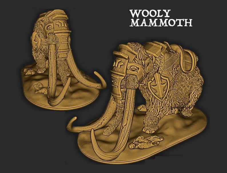 May include: A gold-colored miniature figurine of a woolly mammoth wearing armor and a saddle. The mammoth is standing on a circular base with a textured surface. The text "WOOLY MAMMOTH" is printed in white on a black background.