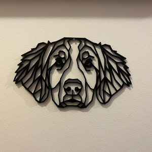 May include: Black and white geometric silhouette of a dog's head, with a detailed design of the fur and facial features.