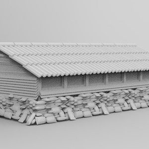 May include: A white model of a traditional Japanese house with a tiled roof and a stone foundation.