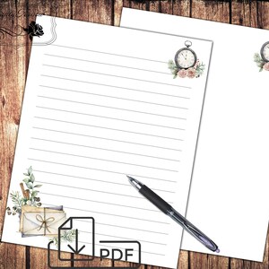 May include: Printable lined stationery featuring a vintage pocket watch with floral accents. The paper has a subtle gray line pattern and a download icon with the word "PDF" in the lower right corner.