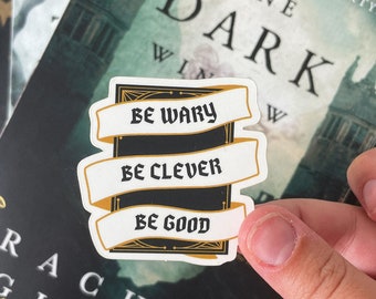 Be Wary, Be Clever, Be Good Matte Vinyl Sticker - One Dark Window, The Shepherd King by Rachel Gillig