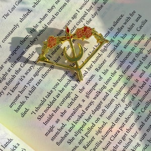 The Goddess&#39; Bow and Arrow, Enamel Pin - The Lost God by Sheila Masterson, Officially Licensed