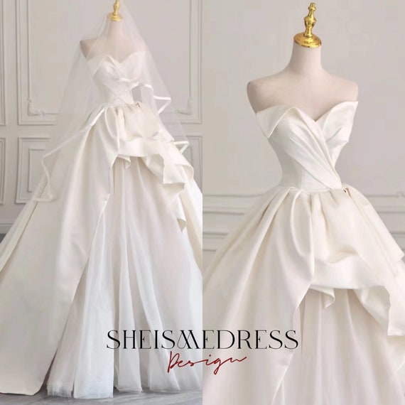 Pleated store ball gown