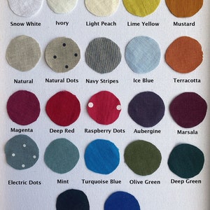 May include: A chart of 18 fabric swatches in various colors and patterns, including snow white, ivory, light peach, lime yellow, mustard, natural, natural dots, navy stripes, ice blue, terracotta, magenta, deep red, raspberry dots, aubergine, marsala, electric dots, mint, turquoise blue, olive green, deep green, black, and ocean blue.