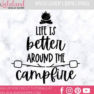 May include: Black and white graphic design with the text "Life is better around the campfire". The design features a campfire with flames and two sticks with marshmallows on the ends.