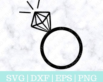 Pode incluir: Silhueta preta e branca de um anel de diamante com um grande diamante no topo. O anel está sobre um fundo de mármore branco. O texto "SVG | DXF | EPS | PNG" está na parte inferior da imagem.