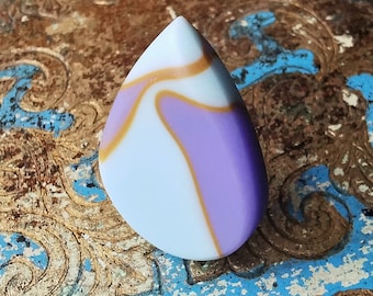 May include: A teardrop-shaped guitar pick with a white, purple, and gold swirl pattern.