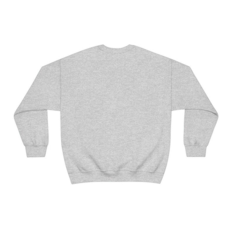May include: A heather gray sweatshirt with long sleeves and a crew neck.
