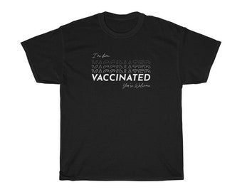 May include: Black t-shirt with the text "I've been vaccinated" and "You're welcome" in white text. The word "vaccinated" is repeated five times in a gradient effect.