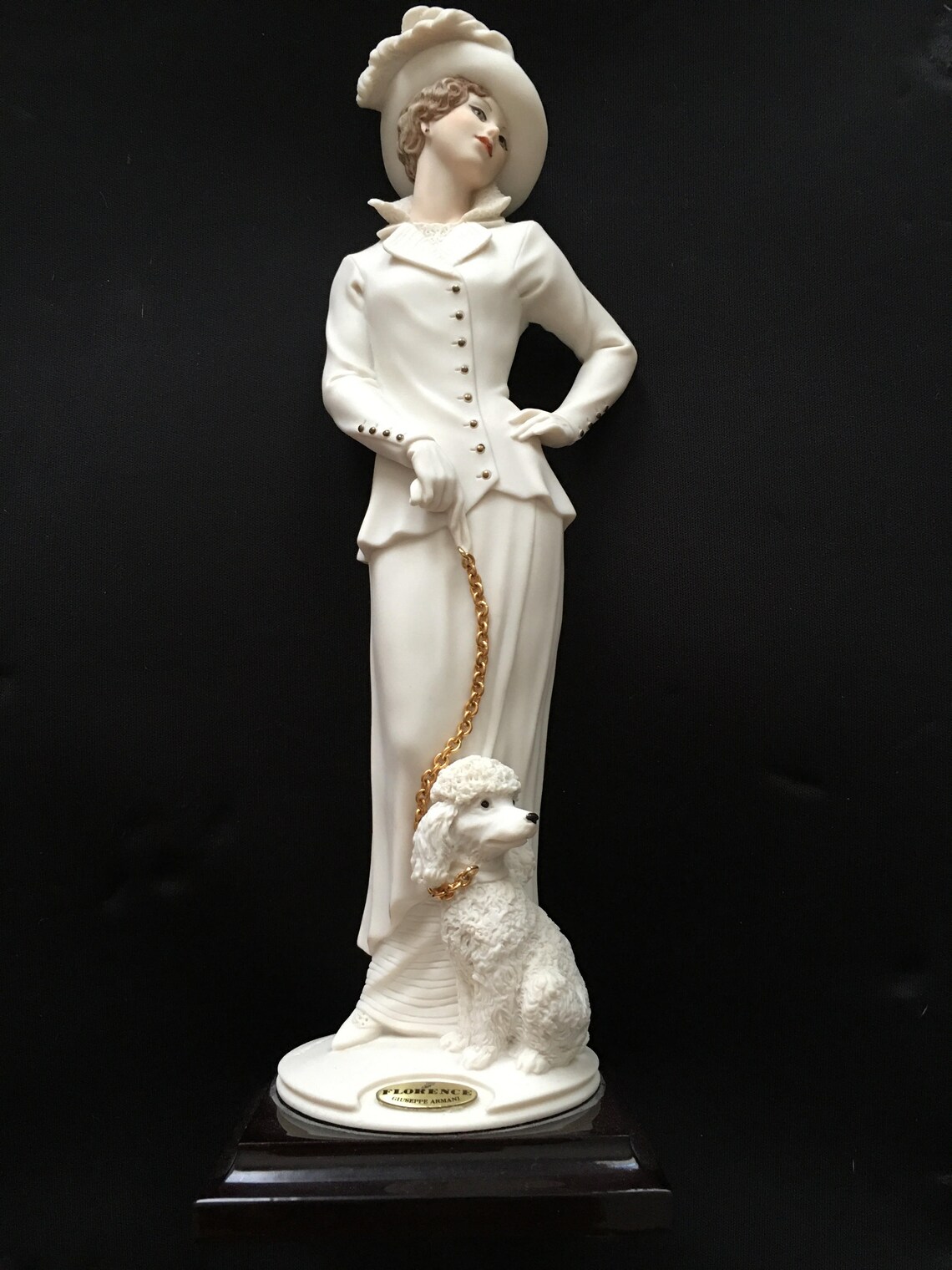 Two different Fine Porcelain Figurines sold separately at Etsy
