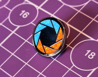 Aperture Science Glitter Enamel Pin