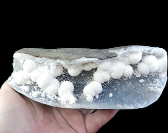 Impressive tower of dark grey chalcedony hosting balls of spiky white mordenite - great zeolite display piece