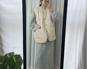 Chaleco acolchado Dumble Warm con grandes bolsillos cuadrados para invierno.