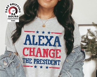 May include: A gray t-shirt with the text "Alexa Change The President" in red, blue, and white. The text is in a bold, blocky font and is surrounded by stars.
