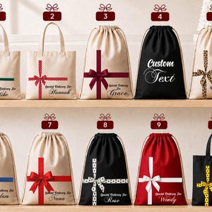 a collection of gift bags and drawstring bags, each with a unique design and ribbon pattern, arranged on a shelf.