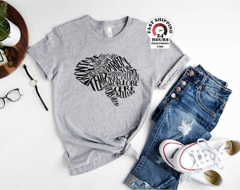May include: A heather gray short-sleeve t-shirt featuring a black graphic of a human brain composed of anatomical terms like frontal lobe, parietal lobe, temporal lobe, occipital lobe, and cerebellum. The shirt is paired with blue denim jeans.