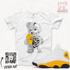 Jordan 13 amarillo best sale