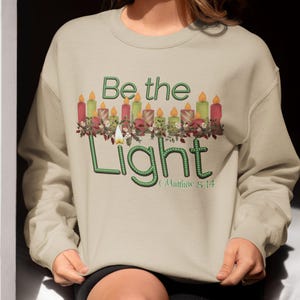 Be The Light Christian Christmas Sweatshirt For Women of Faith, Bible Verse Woman&#39;s Pullover Shirt, Religious Christmas Gift Apparel For Her