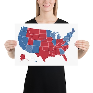 May include: A map of the United States showing the results of an election. The states are colored red and blue, with a few states split between the two colors.
