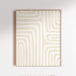 May include: A framed print with a beige background and white abstract lines. The print has a modern minimalist style.