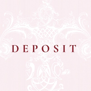 May include: A white decorative design with a delicate floral pattern surrounds the word "DEPOSIT" in a bold, dark red font.