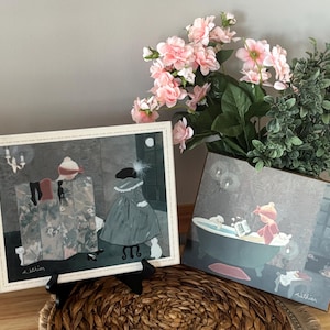 May include: A distressed wooden sign with the words "Welcome to our home" in white lettering. The sign has a rustic finish, ideal for adding a welcoming touch to any home's entrance.