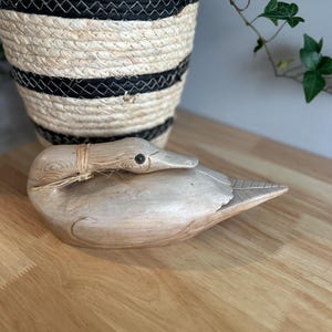 Vintage hand-carved wooden duck decoy