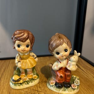 ceramic figurine of a little girl and boy made in Japan 1950’s vintage collectables