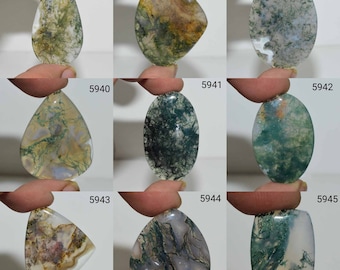 May include: Ten green, brown, and white agate cabochons with a variety of patterns and shapes. The cabochons are displayed on a white background.