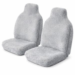 May include: Two light grey car seat covers. The covers are made of a soft, fuzzy material. The seat covers are designed to fit over the existing seats in a vehicle. The covers have a headrest and seat portion.