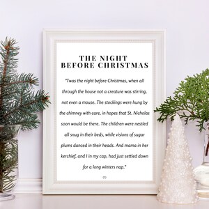 May include: A white framed print with black text featuring the poem "The Night Before Christmas". The poem is set against a white background and the text is centered on the page. The poem is a classic Christmas poem about the night before Christmas.