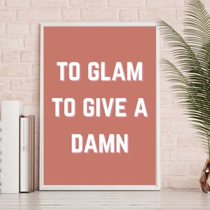 Puede incluir: Un p&oacute;ster enmarcado en blanco con un fondo melocot&oacute;n y texto blanco que dice "To Glam To Give A Damn".