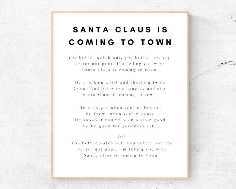 K&ouml;nnte beinhalten: Ein druckbarer Poster mit wei&szlig;em Text auf schwarzem Hintergrund. Der Text lautet "Santa Claus is Coming to Town" und enth&auml;lt Textzeilen aus dem bekannten Weihnachtslied.