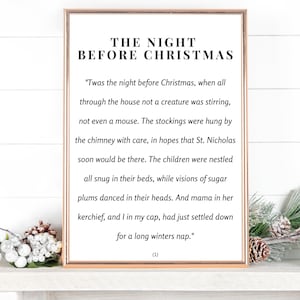 May include: A framed print of the poem "Twas the Night Before Christmas" with the text in black font on a white background. The frame is gold and the poem is surrounded by a white border.