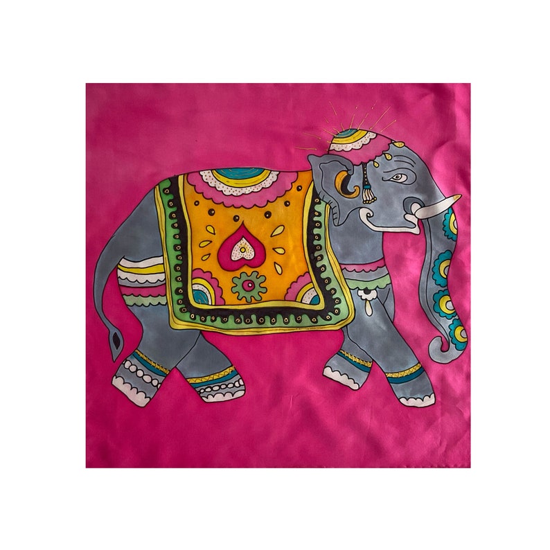 May include: A hand-painted elephant design on a pink fabric square. The elephant is decorated with colorful patterns and a yellow, orange, and green floral design on its back.