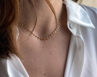 Fine ELENA women's necklace with golden tassels, gold stainless steel ear mesh