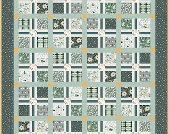 May include: A green and gold patchwork quilt with a variety of holiday-themed patterns, including snowflakes, reindeer, and Christmas trees.