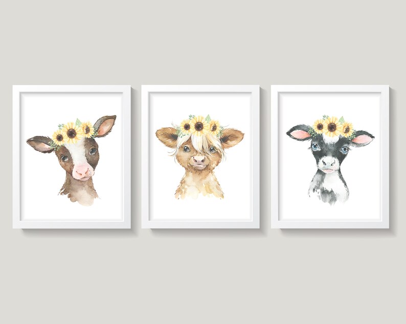 May include: Three watercolor paintings of calves wearing sunflower crowns. Each calf has a different color pattern: brown and white, brown, and black and white.