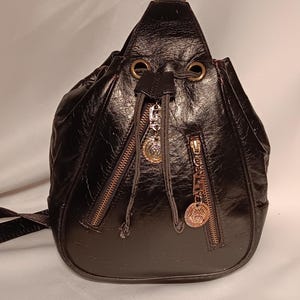 Medusa Style Leather Crossbody Mini Backpack Bag