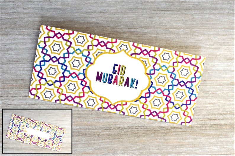 May include: A white card with a colorful geometric pattern and the text "Eid Mubarak!" in a gold frame.