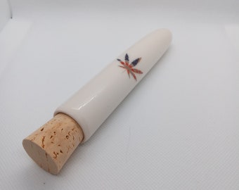 Porcelain dubetube with natural cork stopper. American Flag cannabis leaf!